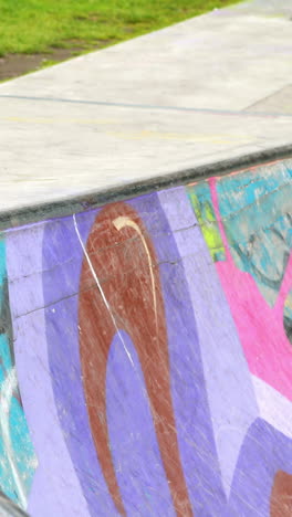 Young-skateboarder-skating-the-outdoor-skatepark