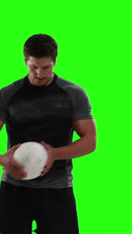 Serious-rugby-player-with-ball-