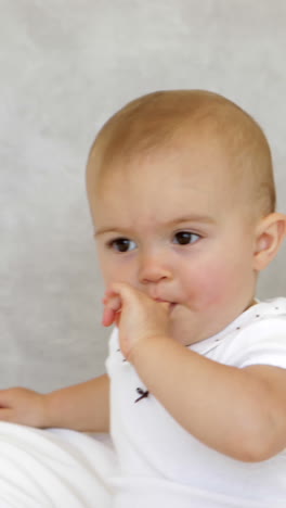 Cute-laughing-baby-on-bed