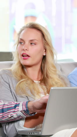 Casual-business-team-having-a-meeting-on-the-couch