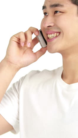 Smiling-handsome-man-having-a-phone-call