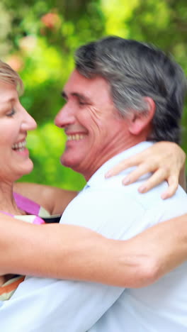 Man-giving-flowers-to-a-woman