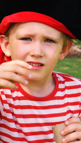 Boy-pretending-to-be-a-pirate