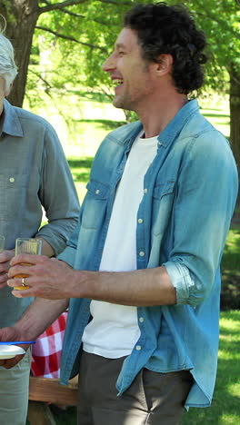 Man-doing-barbecue-for-family