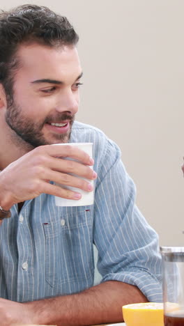 Happy-homosexual-couple-using-computer