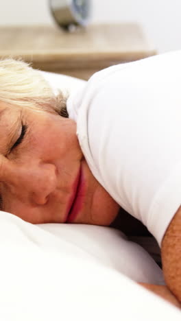 Mature-woman-being-a-restless-sleeper