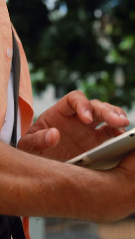 Man-using-tablet-pc