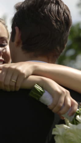 Bride-and-groom-kissing-each-other-outside