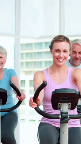 Fitness-group-doing-a-spinning-class