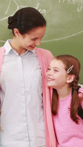 Teacher-posing-with-her-students