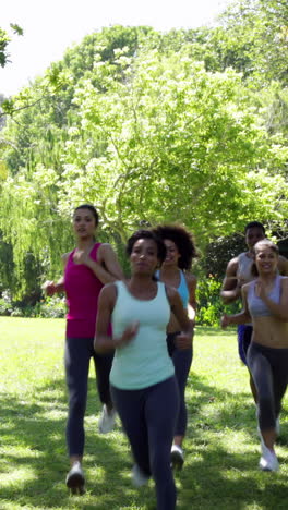 Fit-group-of-friends-racing-towards-the-camera