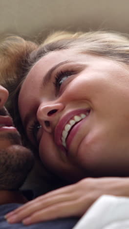 Cute-couple-talking-in-bed