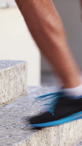 Man-jogging-on-stairs-