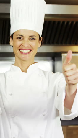 Pretty-chef-showing-thumbs-up