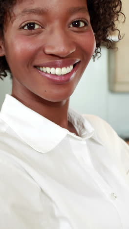 Happy-woman-in-her-kitchen