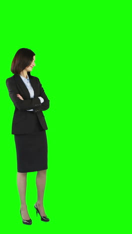 Standing-businesswoman-with-arms-crossed