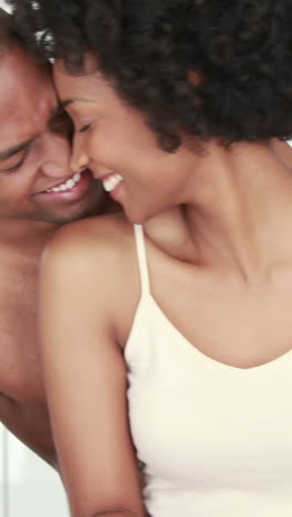 Romantic-smiling-couple-taking-breakfast-together