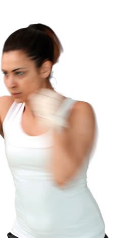 Fit-brunette-punching-with-bandaged-fists