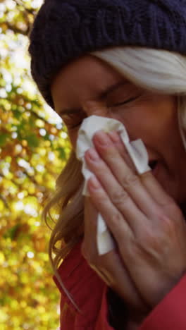 Woman-is-blowing-her-nose