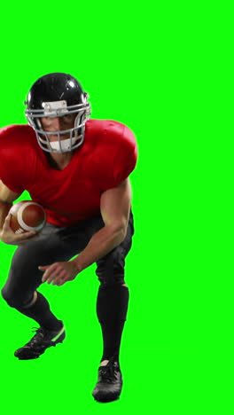 American-football-player-holding-ball