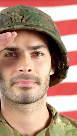 Soldier-saluting-in-front-of-American-flag