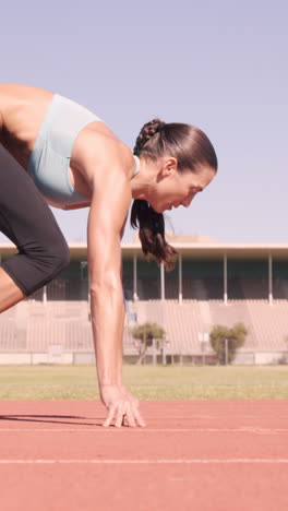 Athlete-woman-starting-running-