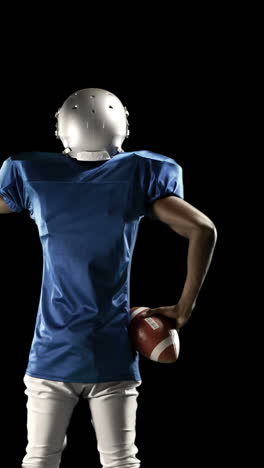 American-Football-Spieler-Spielt