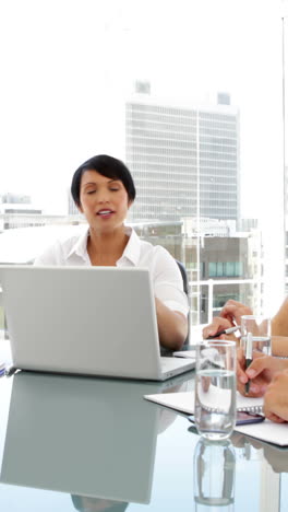 Happy-business-team-applauding-their-colleague