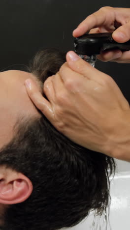 Man-getting-his-hair-wash