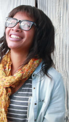 Smiling-hipster-woman-playing-guitar