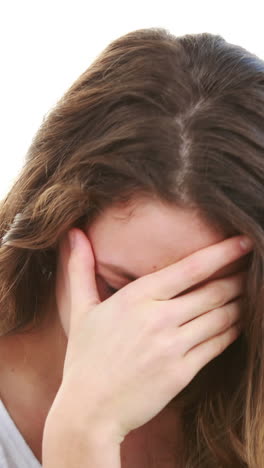 Upset-teen-girl-on-couch-at-home