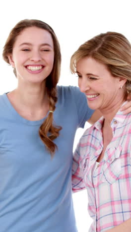 Mother-and-daughter-carrying-rug-together