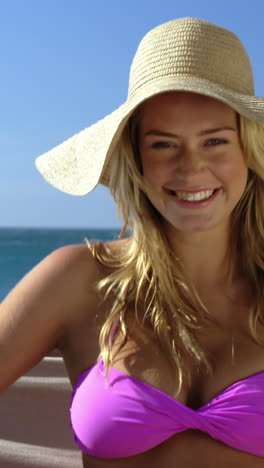 Smiling-woman-sitting-in-hammock