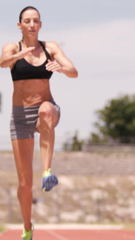 Sportswoman-doing-long-jump