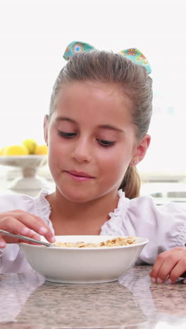 Mother-and-her-daughter-eating-cereals-together