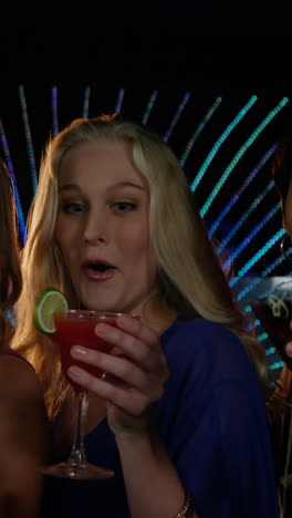 Beautiful-women-having-a-glass-of-cocktail-in-bar