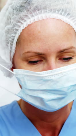 Dentist-and-dental-assistant-wearing-surgical-mask