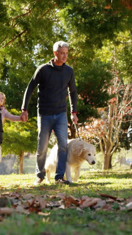 family-with-dog-outdoors