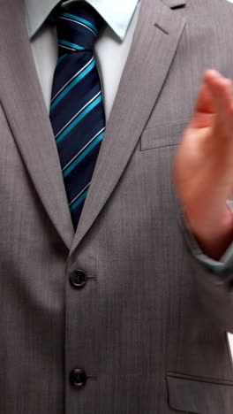 Businessman-clapping-on-white-background