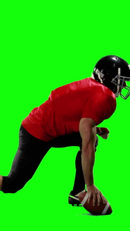 American-football-player-holding-ball