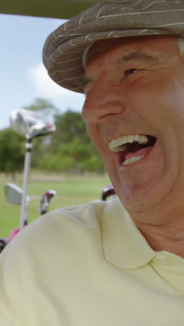 Two-golfers-driving-in-their-golf-buggy-