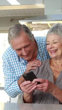 Senior-couple-using-smart-phone