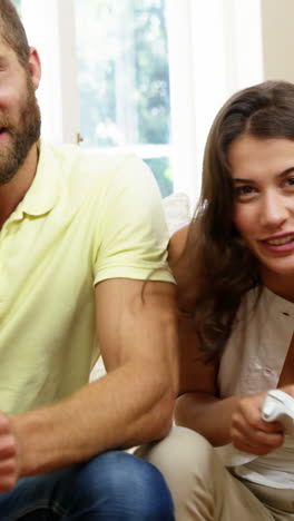 Happy-couple-playing-video-games