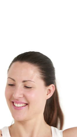 Happy-female-athlete-holding-medal