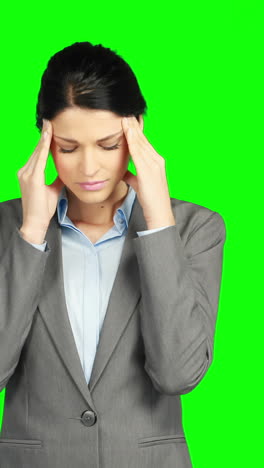 Worried-businesswoman-holding-her-head