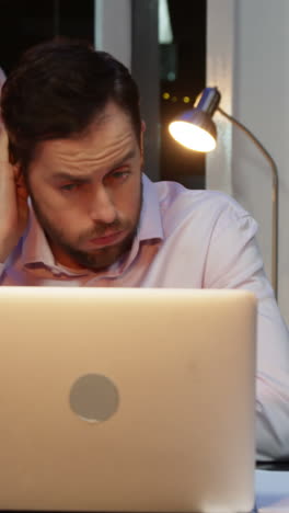 Businessman-working-on-laptop