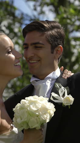 Bride-and-groom-taking-a-selfie-outside