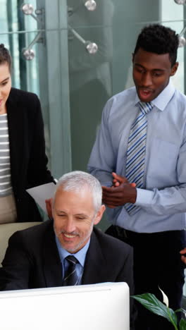 Group-of-business-people-appreciating-their-colleagues-works