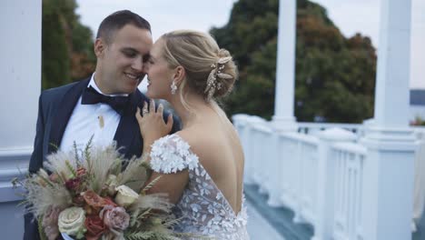 Bride-and-groom-pose-at-luxury-hotel