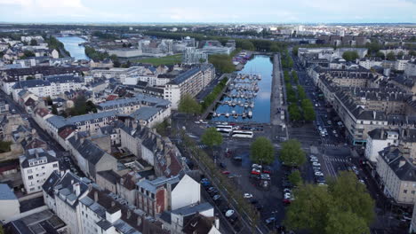 Aerial-flying-towards-marina-in-city-of-Caen,-France